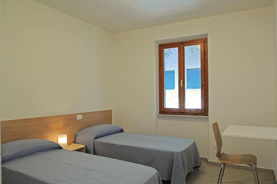 Appartamenti Casa Pineta Marina di Campo Værelse billede
